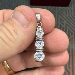 Elegant Sterling Silver Pendant with Clear Stones